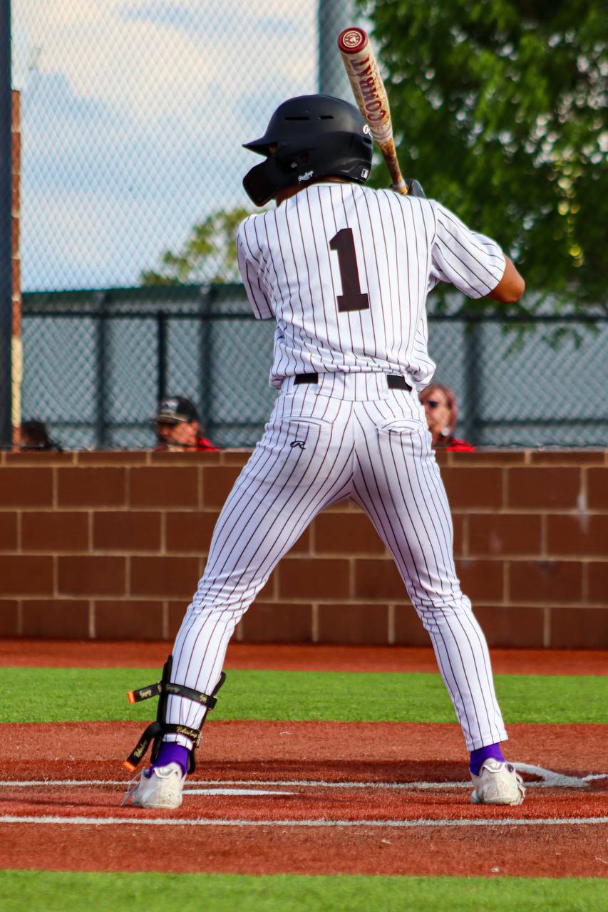 Aleck Hunte at bat wearing #1 Coyotes uniform